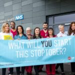 Group photo of Stoptober campaigners with banner
