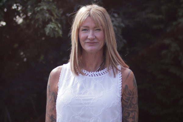 Karen Slater standing in her garden